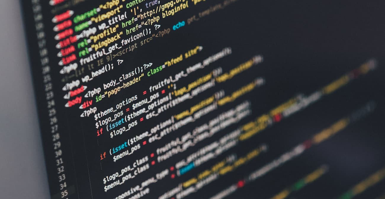 A dark editor window filled with syntax-highlighted source code.